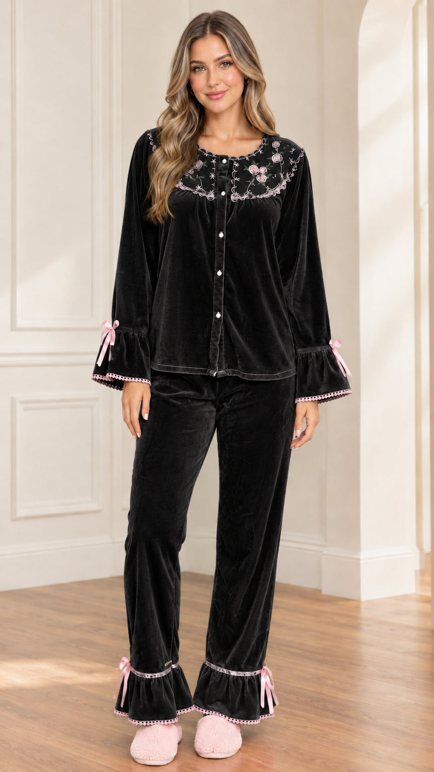 Women's black velvet pajama set with contrast pink embroidery and ribbon bows