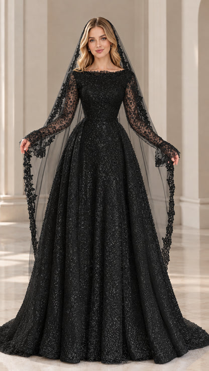 Model wearing black sequin lace long sleeve evening bridal gown with veil