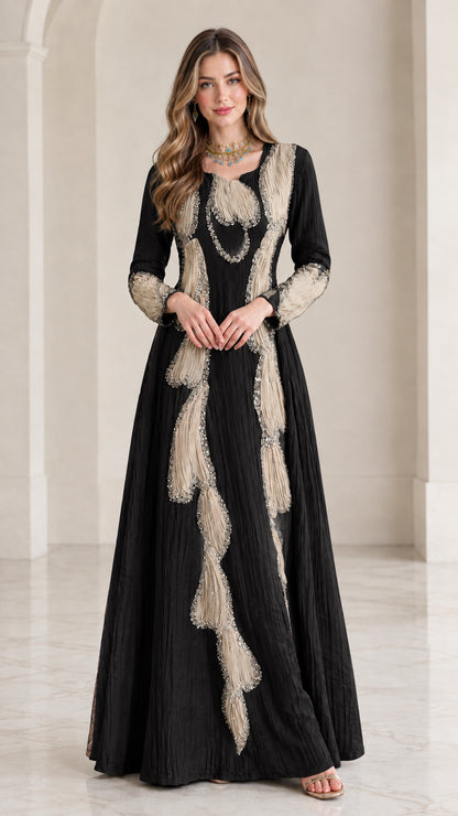 Full front view of black crinkle maxi dress with cream beaded applique