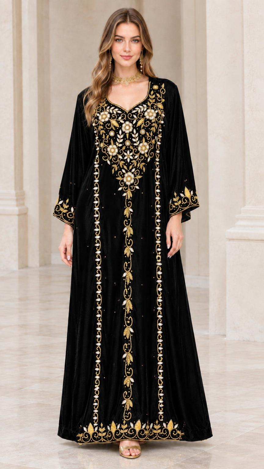 Full-length view of black embroidered velvet kaftan dress