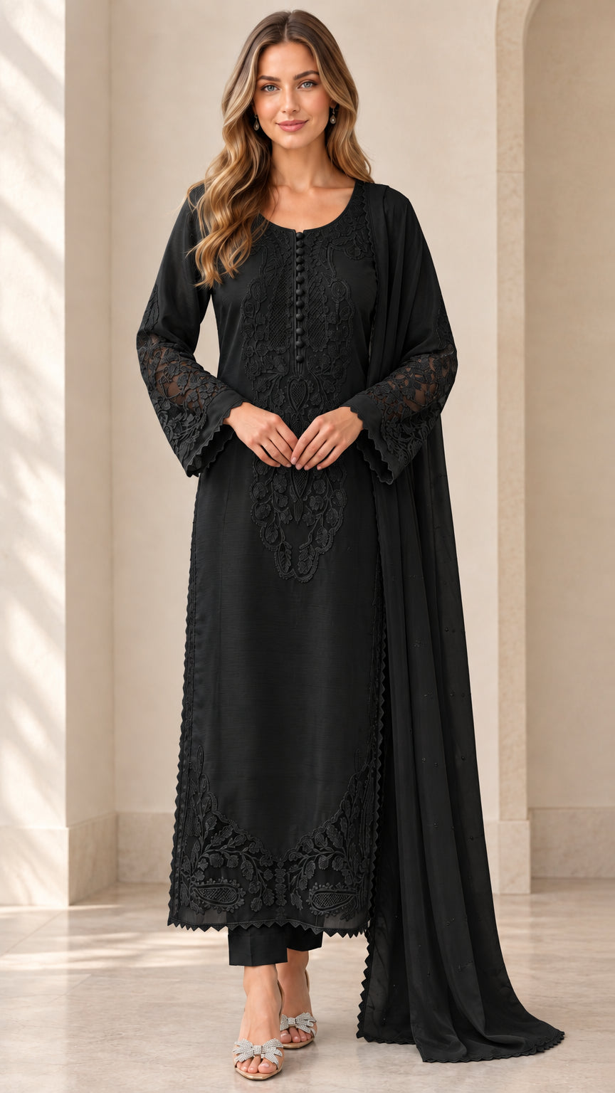 Model wearing black embroidered 3-piece kurta pant suit set with dupatta