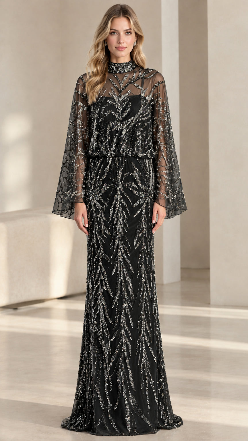 Front view of woman wearing black beaded cape sleeve evening gown
