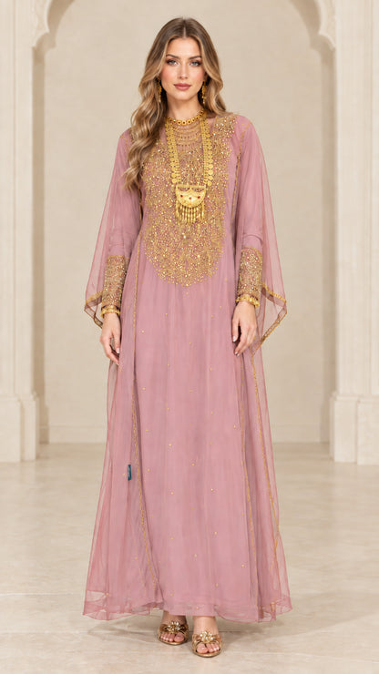 Front view of woman wearing dusty rose embroidered sheer overlay maxi kaftan gown