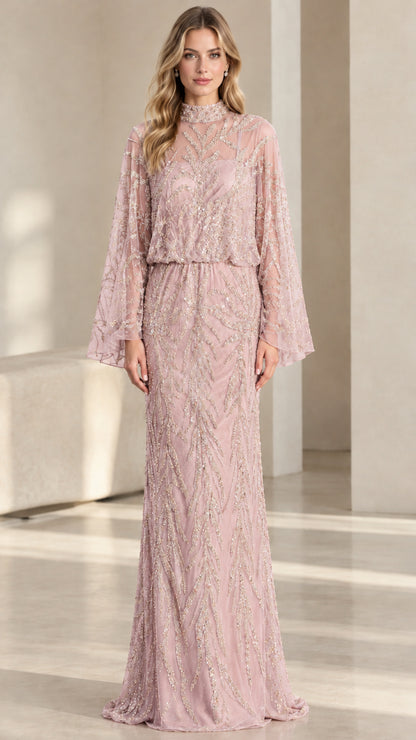 Front view of woman wearing blush pink beaded cape sleeve formal evening dress