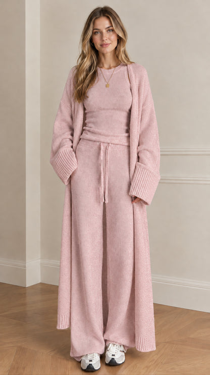 Front view of woman wearing dusty pink 3-piece knit lounge set with long duster