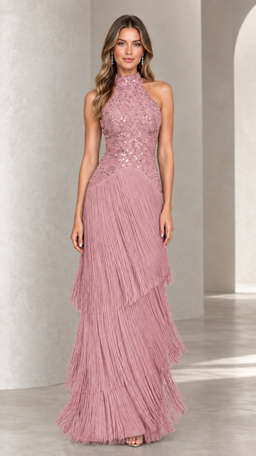 Front view of dusty rose pink halter sequin tiered fringe evening maxi dress