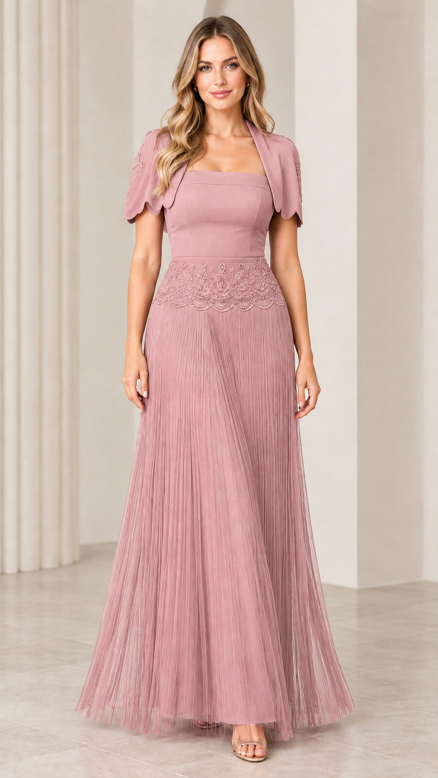 Front view of woman wearing dusty rose pleated maxi formal gown with bolero jacket