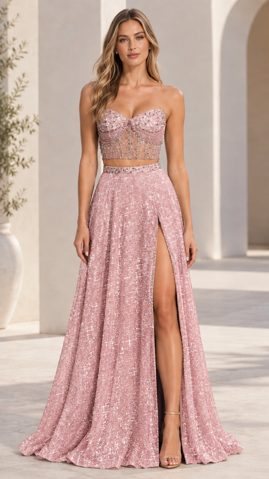 Model wearing blush pink two-piece sparkling corset evening dress with side slit