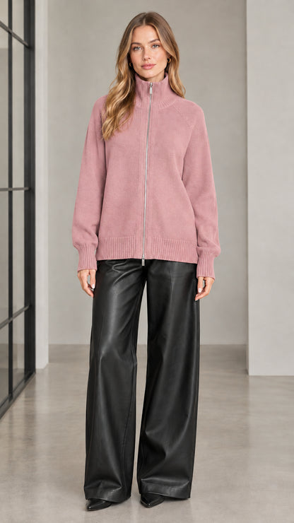 Front view of woman wearing dusty pink full zip knit cardigan