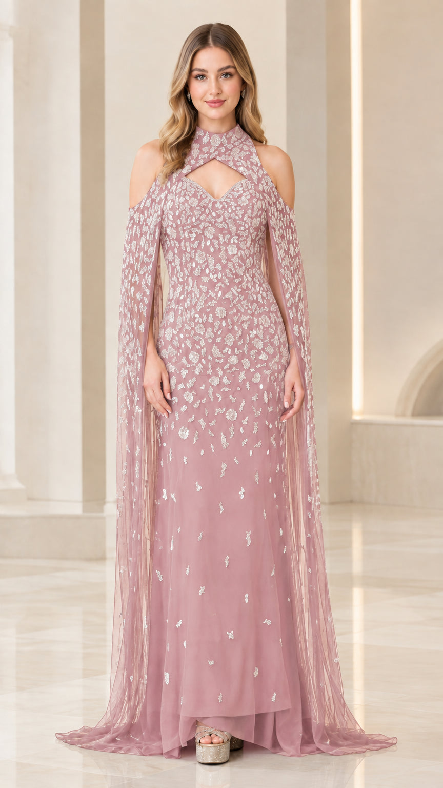 Full-length view of dusty pink beaded evening gown with sheer tulle cape