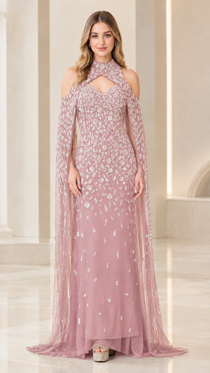 Full-length view of dusty pink beaded evening gown with sheer tulle cape