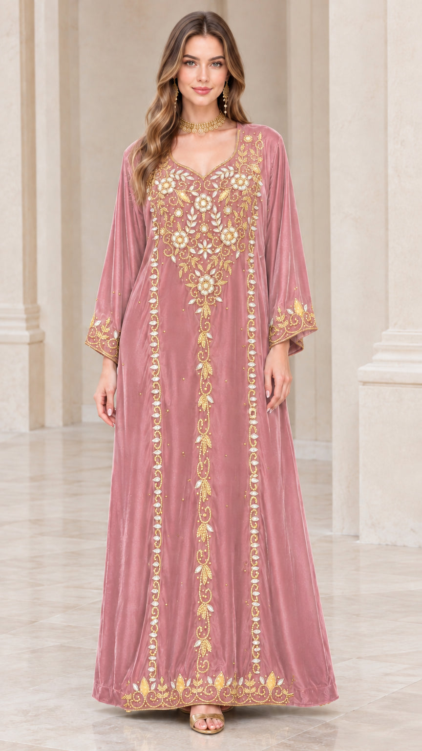 Full-length view of dusty rose pink embroidered velvet kaftan dress