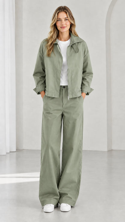 Full front view of women's sage green utility zip jacket and wide-leg pants set