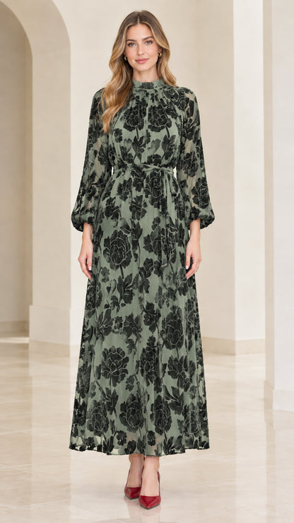 Front view of model wearing sage green floral velvet burnout maxi dress