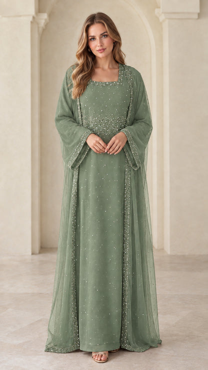 Front view of model wearing sage green beaded layered abaya gown