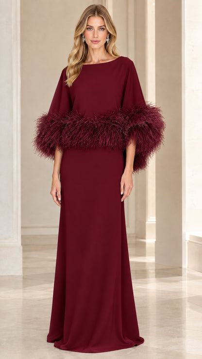 Front full-length view of burgundy red feather-trim cape sleeve evening gown