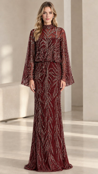 Front view of woman wearing burgundy red beaded cape sleeve evening gown