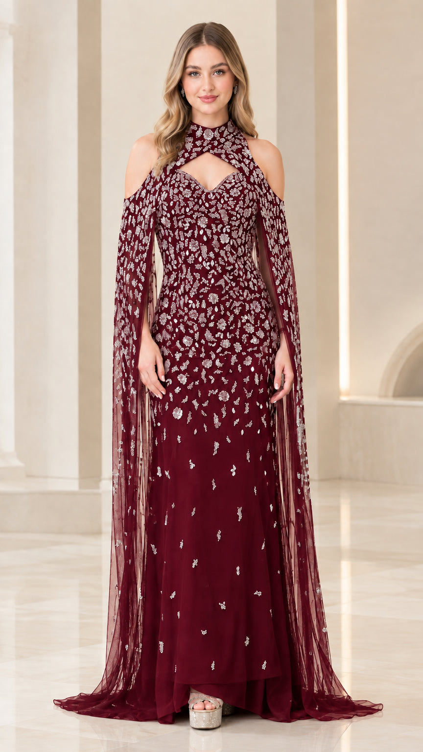 Full-length view of burgundy red sequined formal gown with cape sleeves