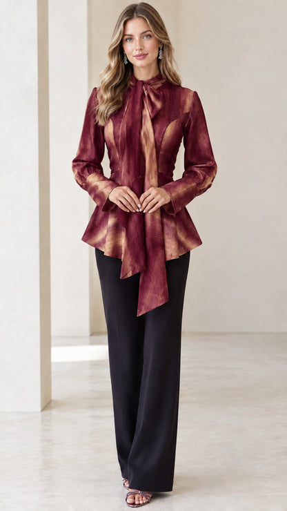Model wearing Wine Red watercolor long sleeve tie-neck peplum blouse