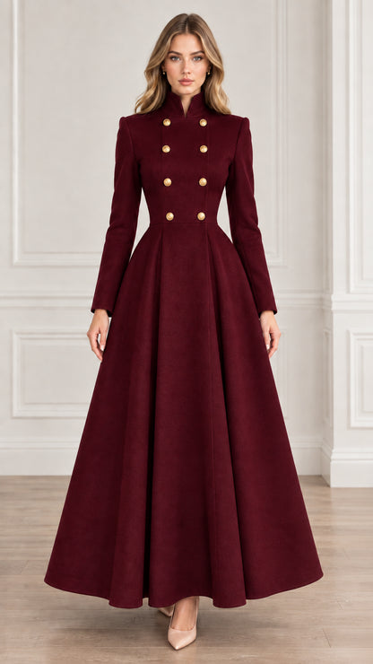Front view of burgundy red double-breasted high neck flared maxi coat