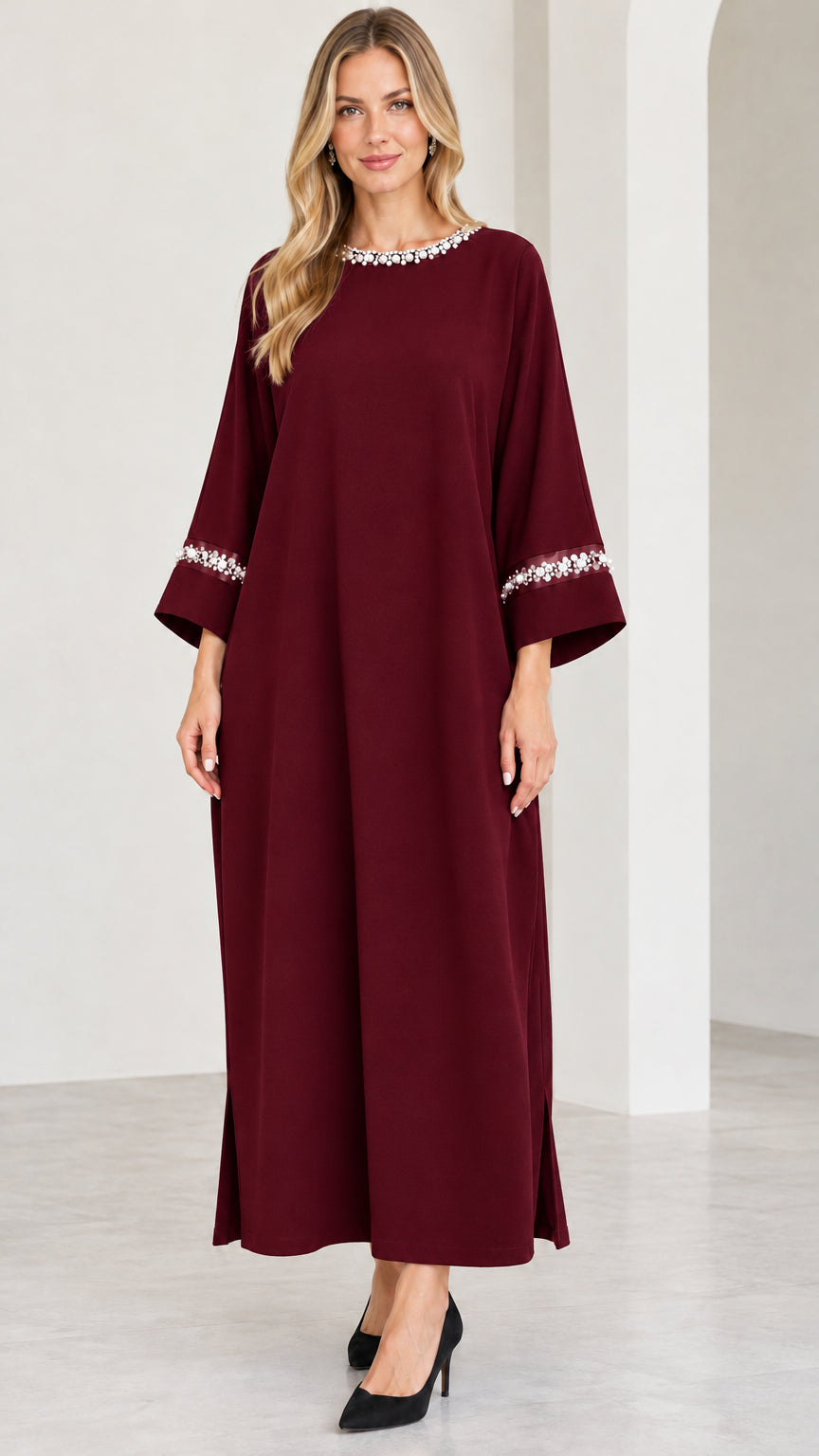 Full-length view of burgundy red kaftan dress with beaded cuffs