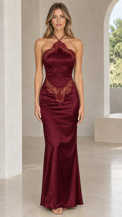Front view of model wearing burgundy satin halter maxi dress with tonal lace trim