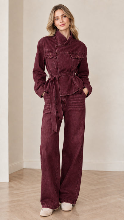 Front view of woman wearing Burgundy washed denim two-piece jacket and jeans set