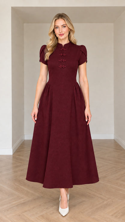 Front view of woman wearing Burgundy mandarin collar A-line midi dress