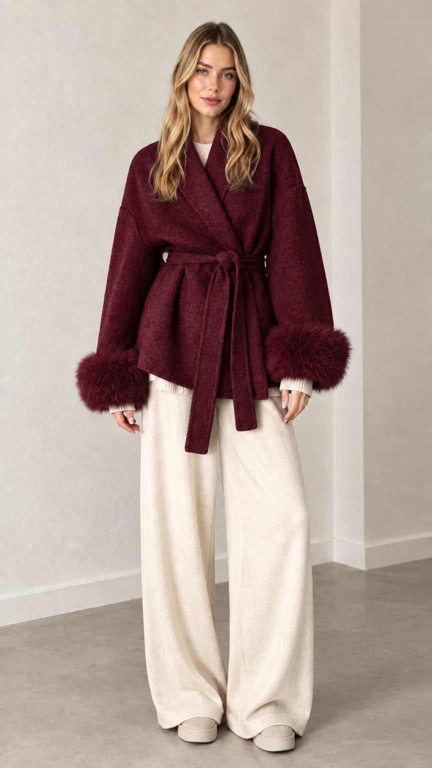 Front view of burgundy wine belted wrap coat with faux fur trim
