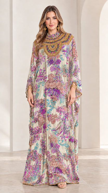 Front view of model wearing Ivory floral velvet embellished kaftan maxi dress