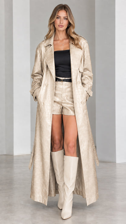 Full-length front view of champagne gold croc-embossed maxi trench coat