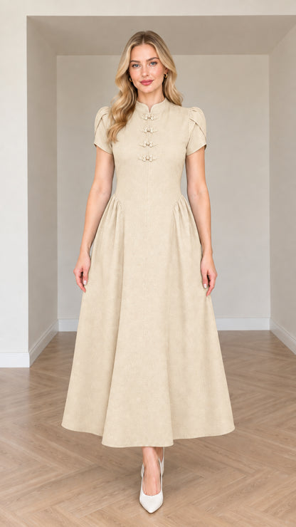 Front view of woman wearing Beige mandarin collar A-line midi dress