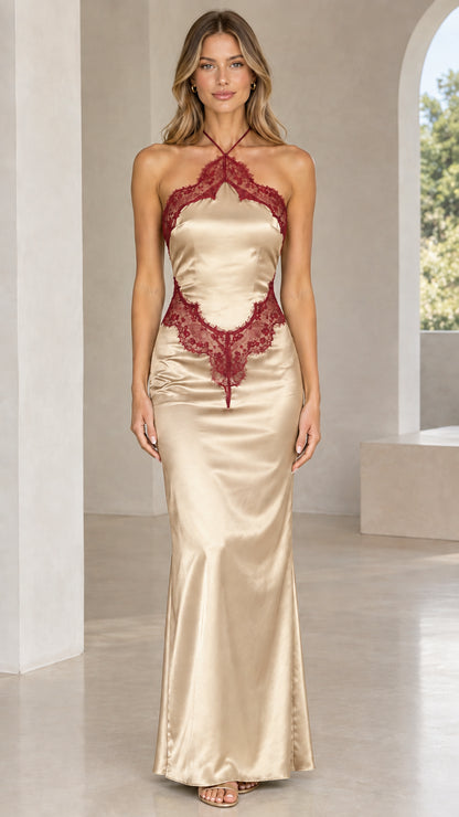 Front view of model wearing champagne gold satin halter maxi dress with burgundy lace trim