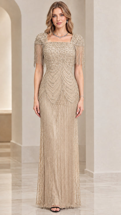 Front view of champagne gold beaded evening gown with fringe overlay