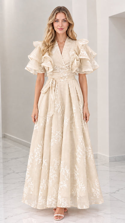 Front full-length view of champagne beige floral embroidered maxi dress with tiered ruffle sleeves