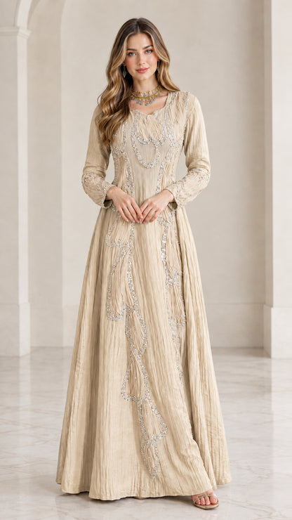 Full front view of champagne beige crinkle maxi dress with tonal embellishments