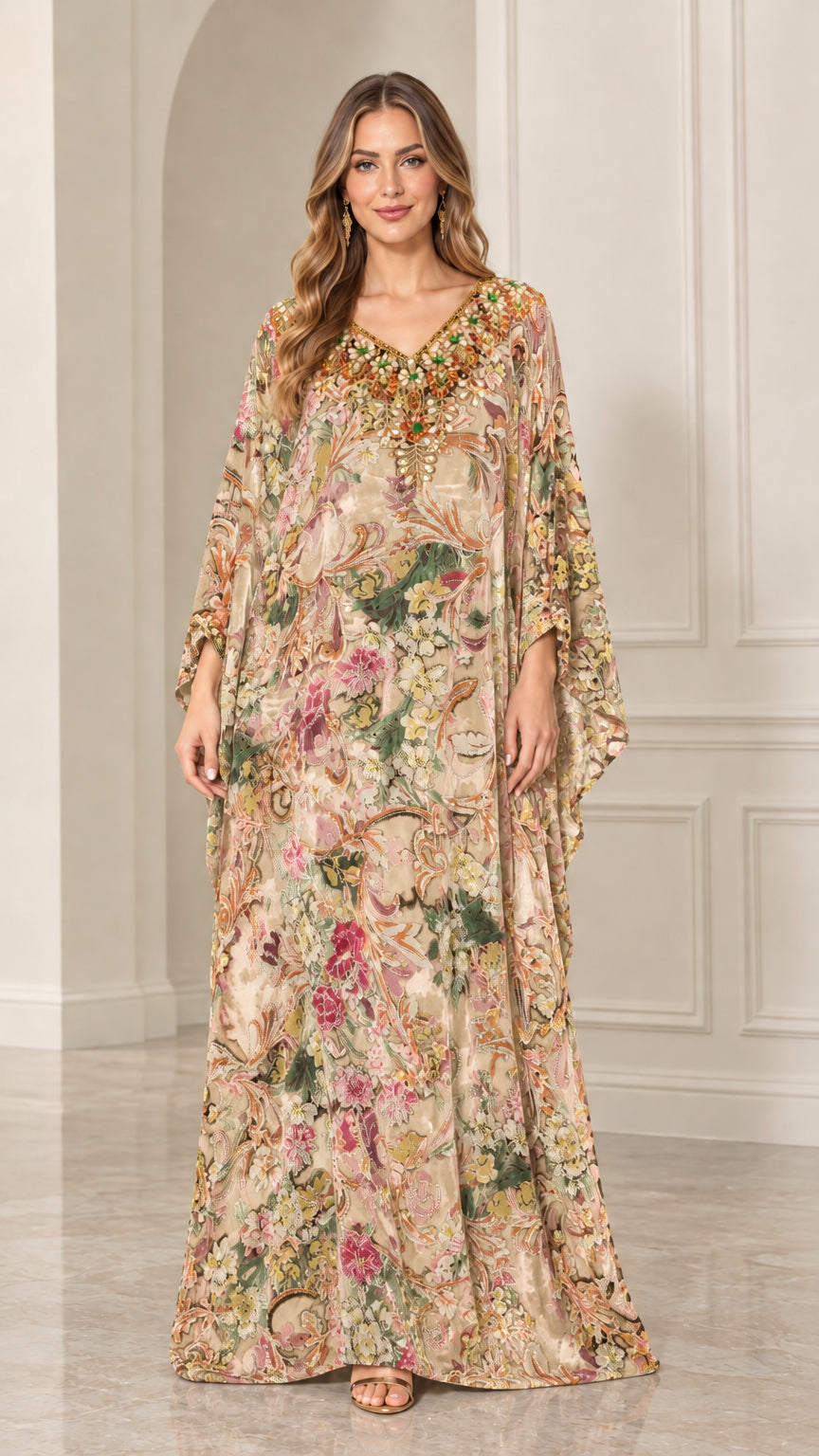 Front view of woman wearing Champagne floral velvet embellished kaftan maxi dress